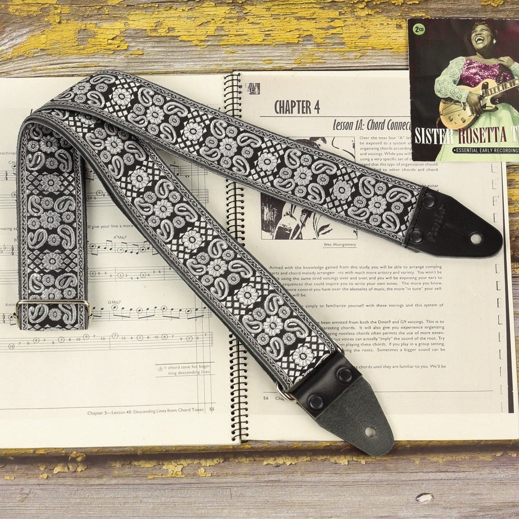 Black guitar strap with spirals