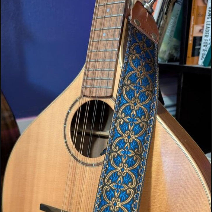 customer revire the blue celtic guitar strap - the strap is paired with a mandolin