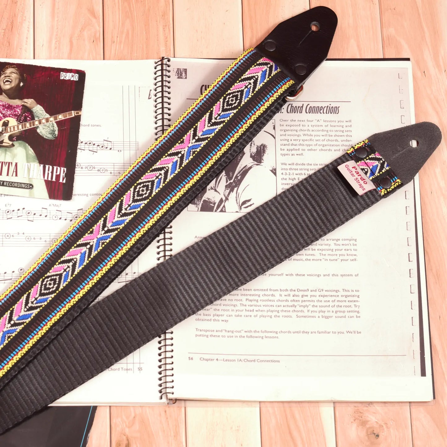 Tribal guitar strap with jaquard fabric for the frontside and backing black seatbelt