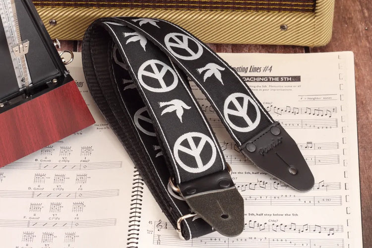 Guitar straps with hippie 60s-style patterns