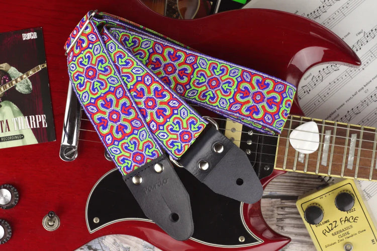 colorful straps for guitar and bass with psychedelic patterns