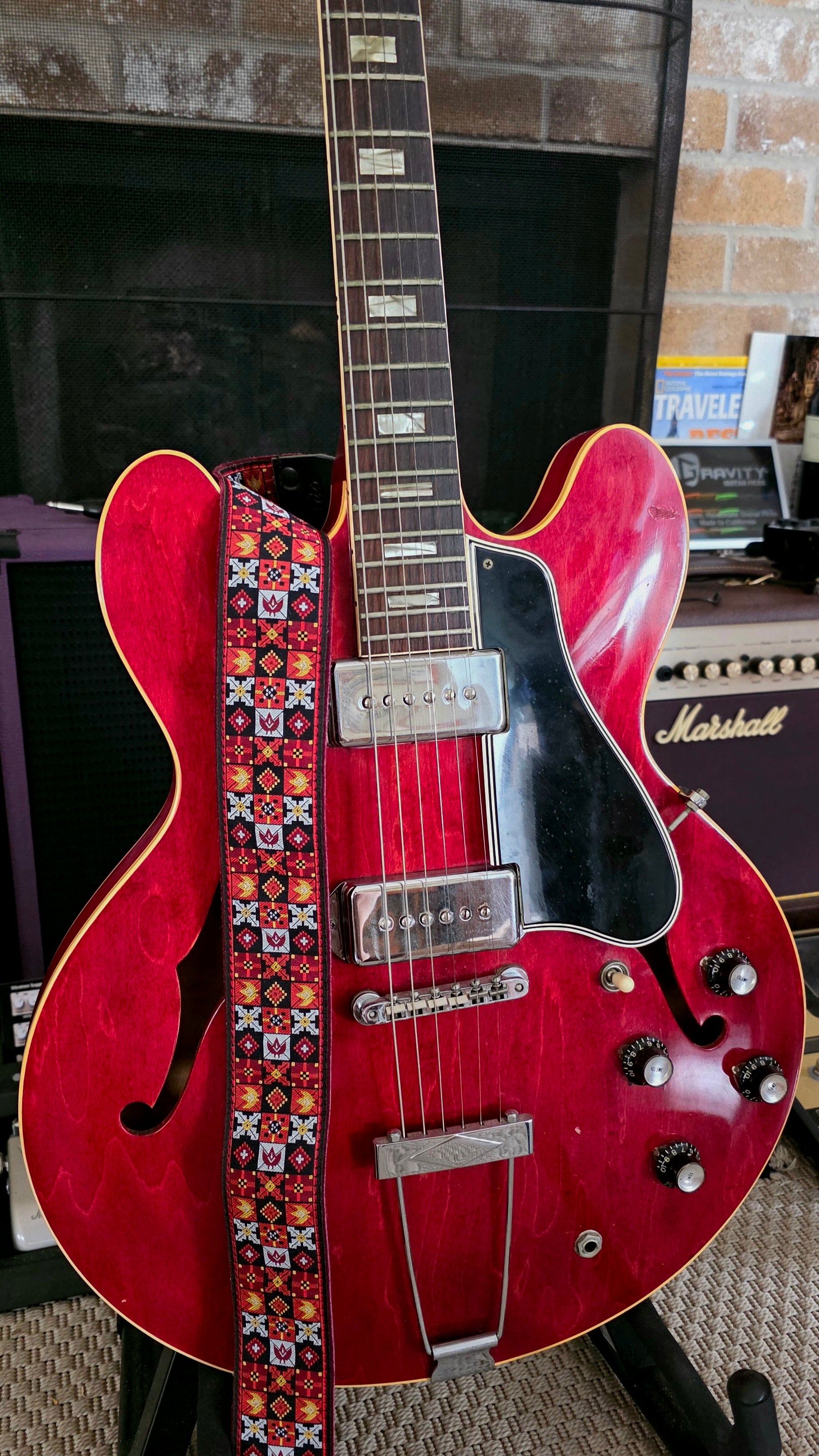 Vintage 1966 Gibson ES-330 hollowbody electric guitar paired with a handcrafted Spanish Pardo guitar strap.