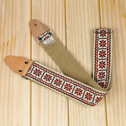 Model White and Red Pueblo, white and red fabric with native pattern, backing suede color clear brown, end leather parts color clear brown, metal hardware color chrome