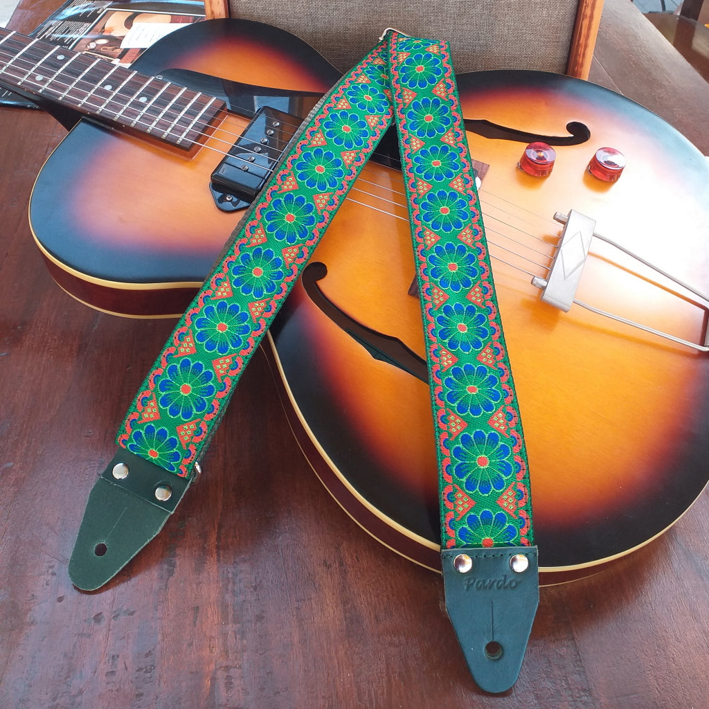 Floral Daisy green guitar strap with blue flowers
