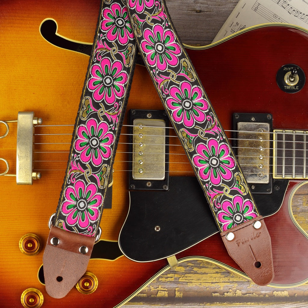 The Spring guitar strap model strap attached to an electric guitar, A jazz guitar