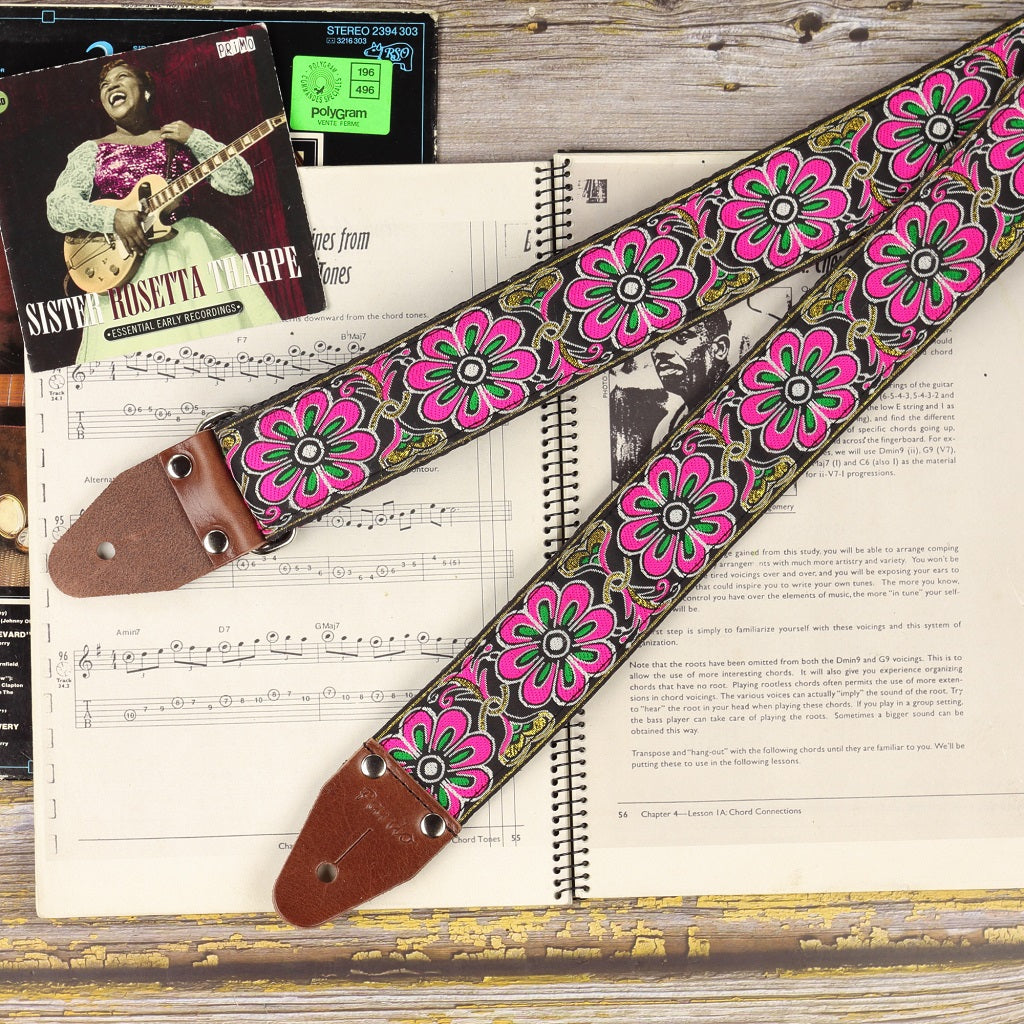 Artistic photo of the spring flowers guitar strap with flowers and natural elements for a boho vibe.