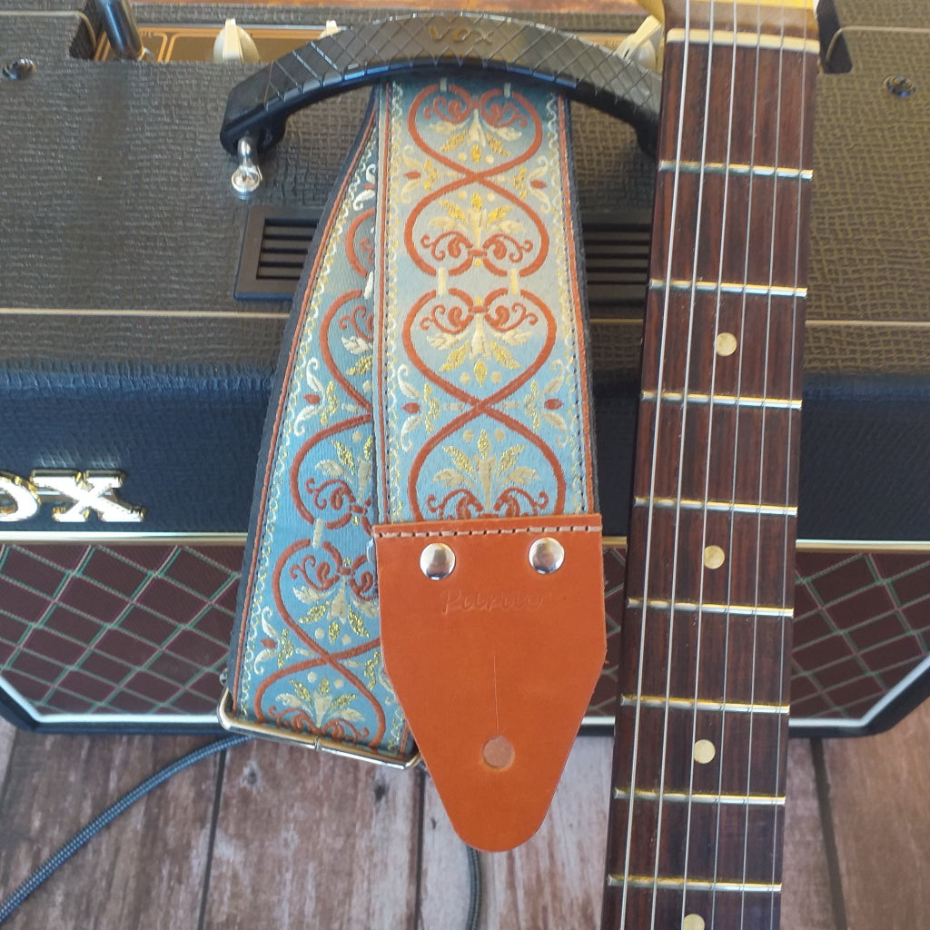 Zeleste Pardo guitar straps hippie strap with a fender Stratocaster and a Vox amp