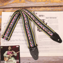 A complete view of the Black Cherokee Indigenous Style Guitar Strap, showing its vibrant multicolor geometric pattern from end to end.
