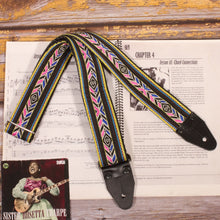 A complete view of the Black Cherokee Indigenous Style Guitar Strap, showing its vibrant multicolor geometric pattern from end to end.