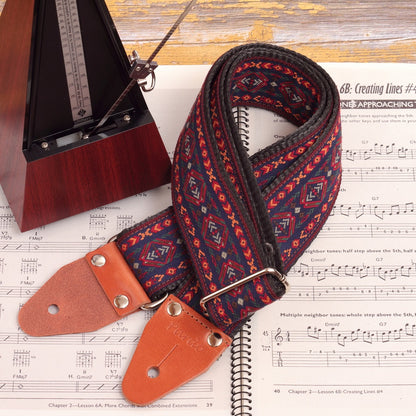 Close-up of the Blue Cree strap’s intricate jacquard pattern in blue, orange, and red.