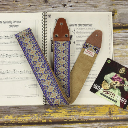 Front and rear views of the Blue Gothian guitar strap showing its detailed jacquard fabric and Clear Brown suede backing.