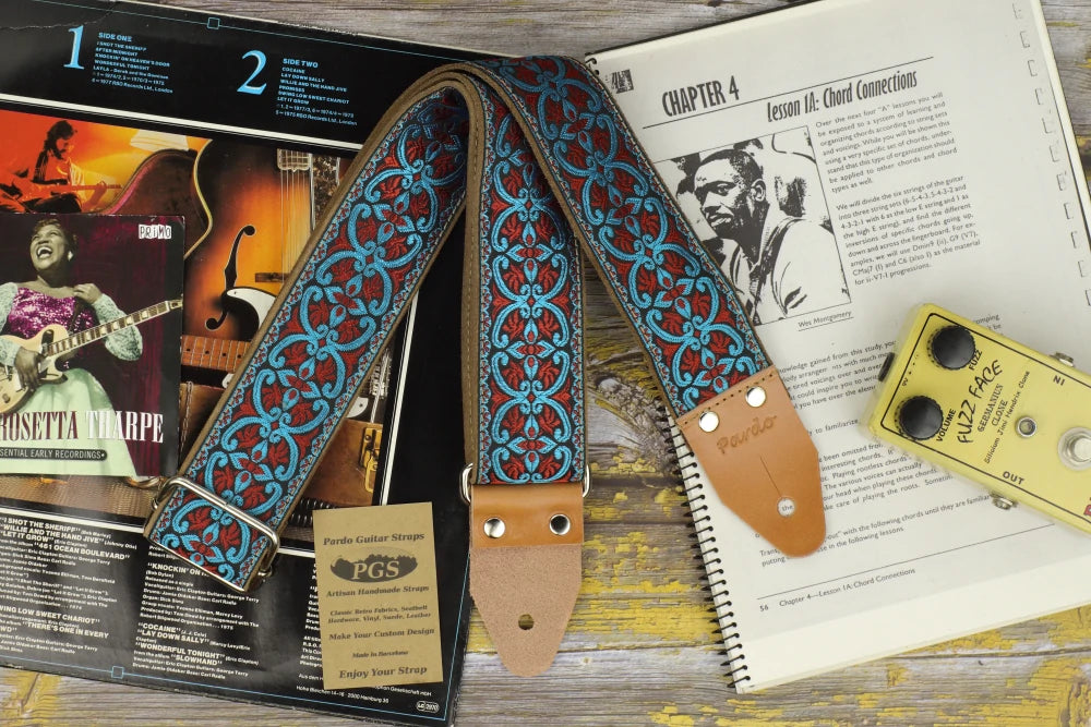 retro guitar strap with a colored patterns with intricate and colored shapes- vintage style for musicians and guitarists.