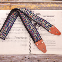 Blue Reverie floral jacquard guitar strap with blue background and cream flowers