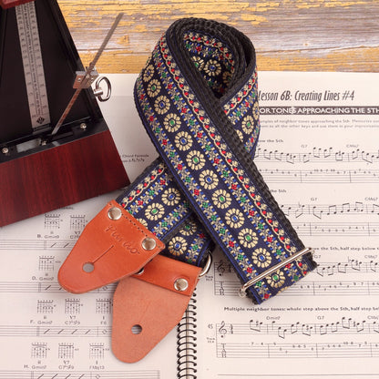 Blue Reverie floral guitar strap styled with metronome and songbook - Home studio guitarists way of life