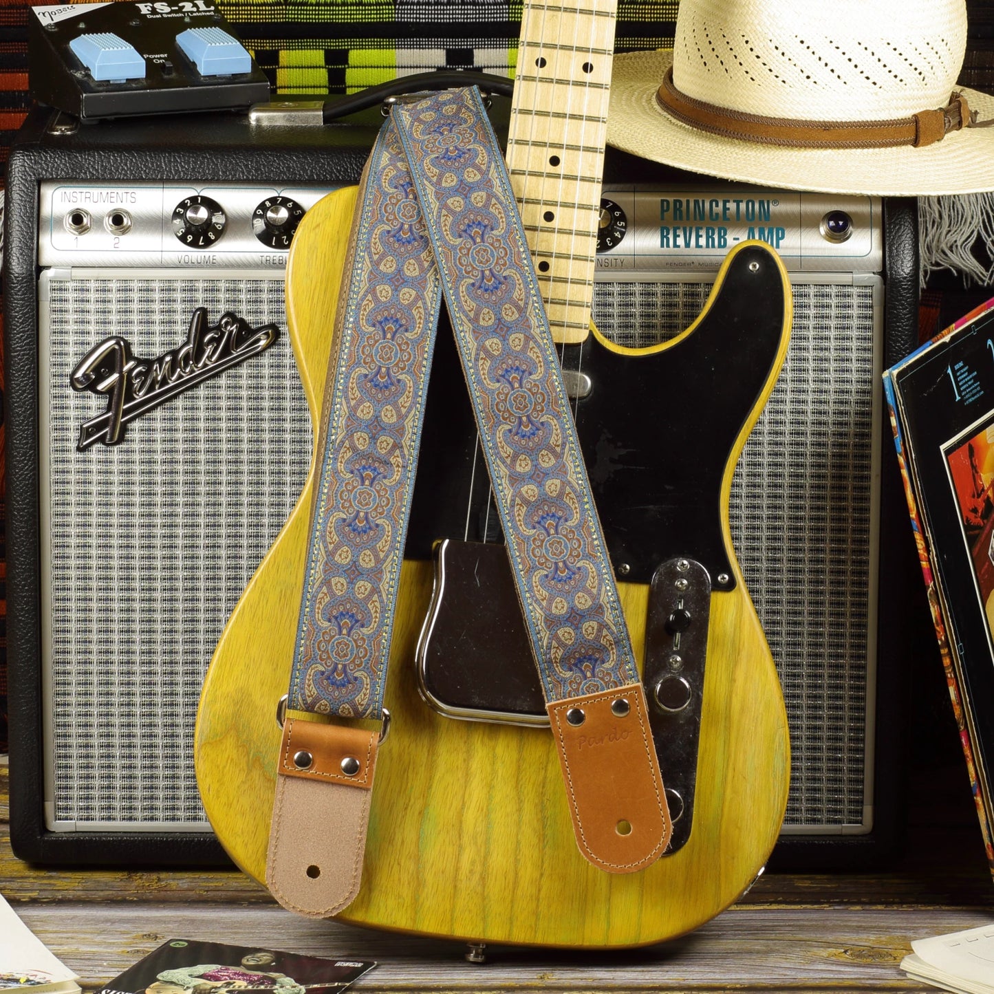 Blusie guitar strap displayed with a Fender Telecaster ’52 and a Fender Princeton Reverb amplifier.