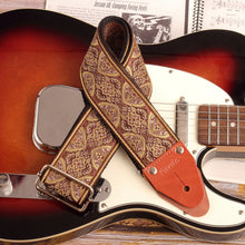 Close-up of the woven psychedelic fabric pattern and leather ends parts - guitar strap made to order for musicians