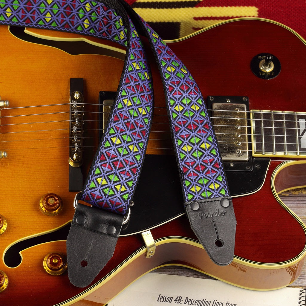 Eric Johnson Blue Monterey guitar strap, Hendrix-inspired 1960s Ace-style design - paired with a L5 Gibson style guitar