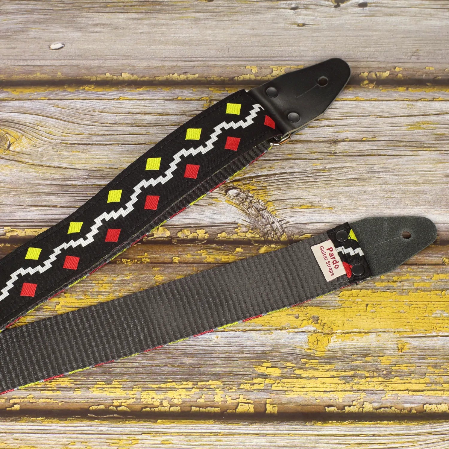 George Harrison guitar strap with customizable backing, featuring the black seatbelt material option