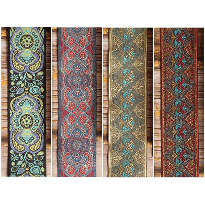 Four Gilded Orbit guitar strap designs shown together: Blue Paisley, Efrit, Dune and Pilgrim.