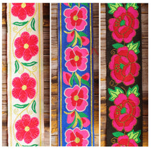 Three Grand Petal guitar strap designs shown together: Persephone, Poppy and Red Roses.