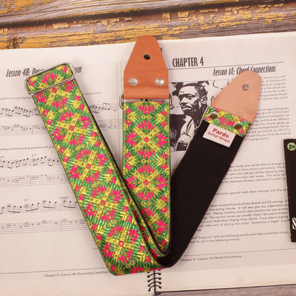 Guitar strap made with jacquard fabric with green, yellow and mora colors