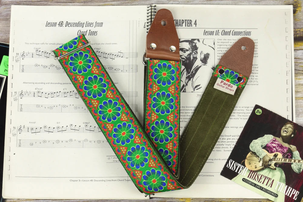 Green floral  guitar strap inspired in hippie patterns evocating the 60s era