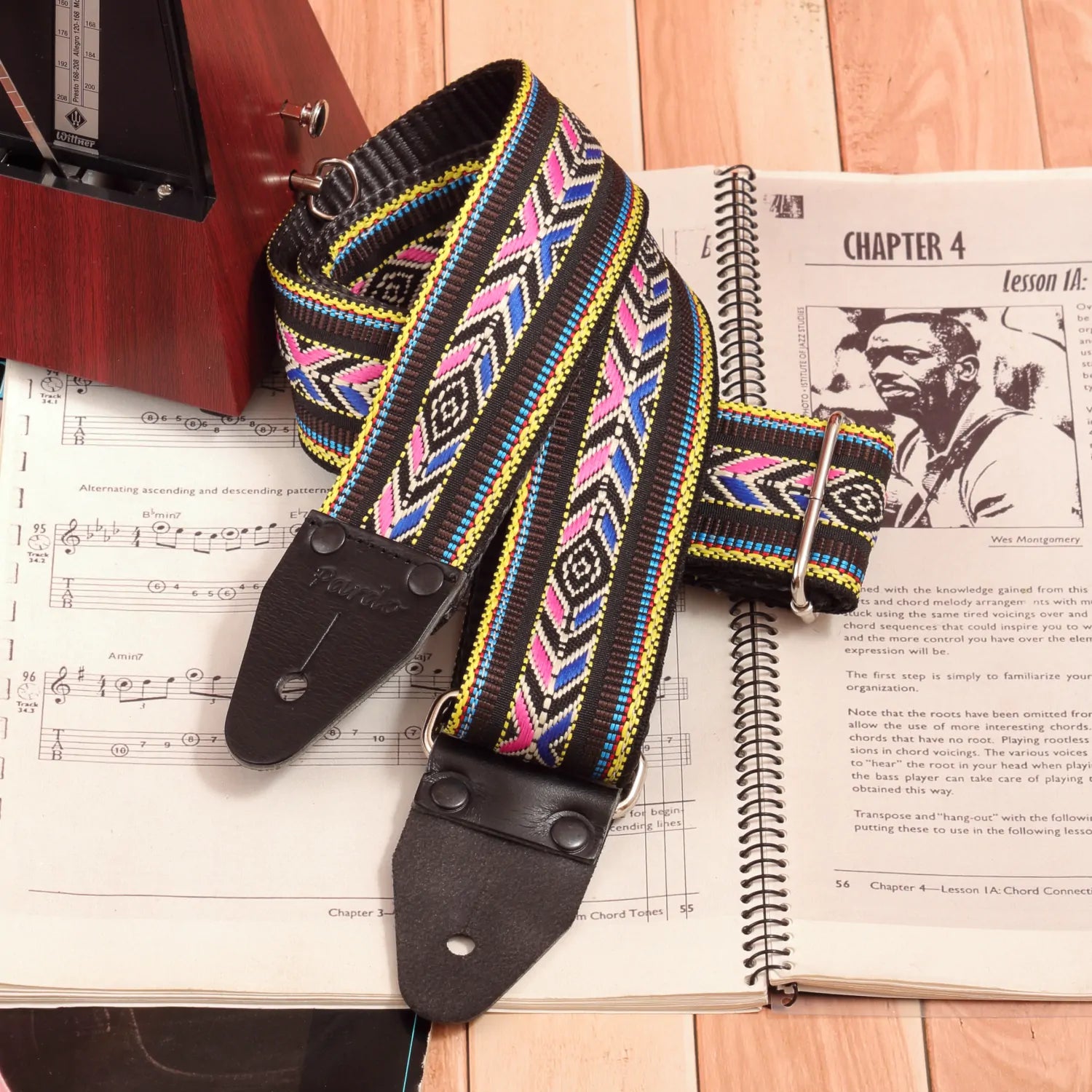 A close-up of the front section, highlighting the woven jacquard fabric and intricate Native-inspired design details