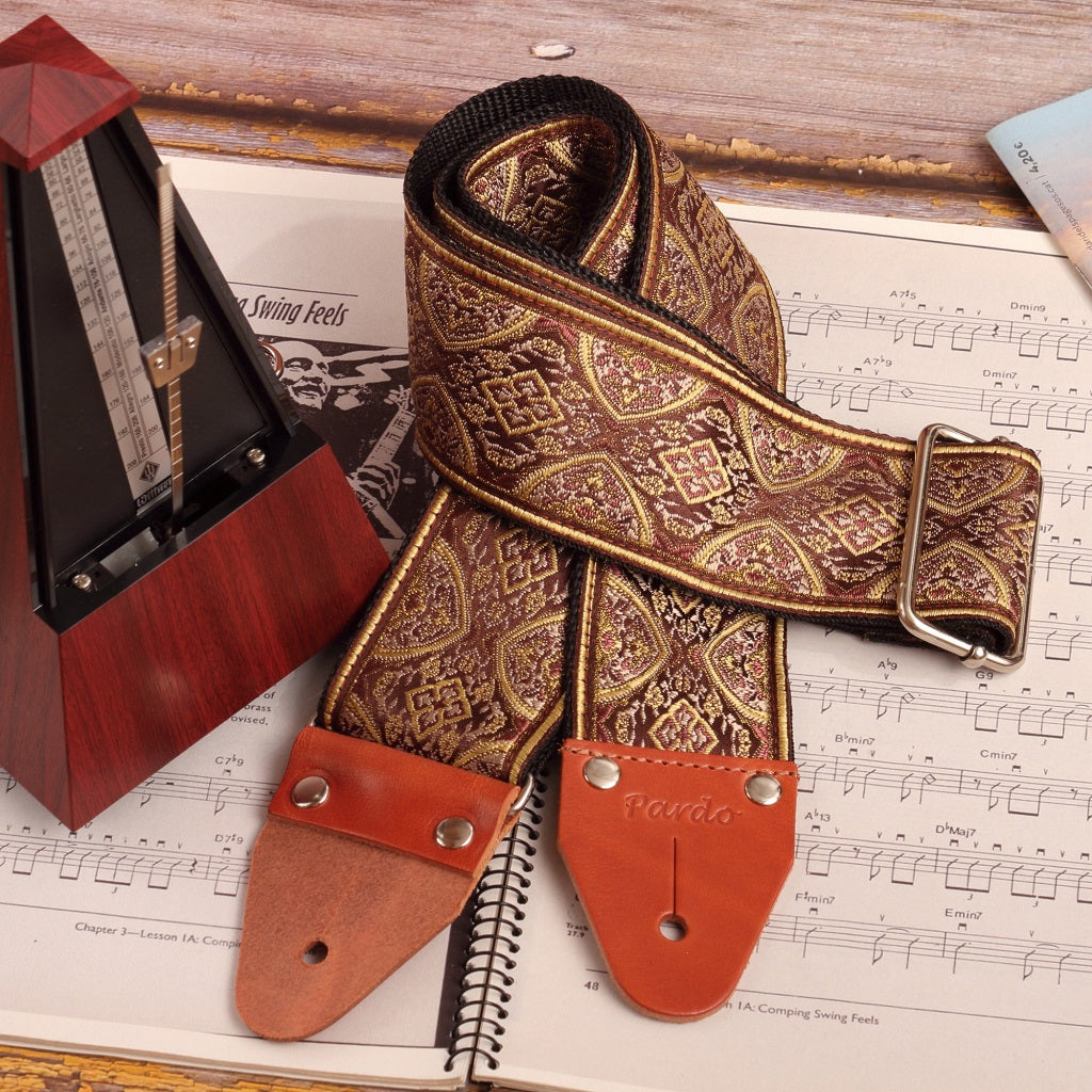 Strap styled alongside a vintage metronome