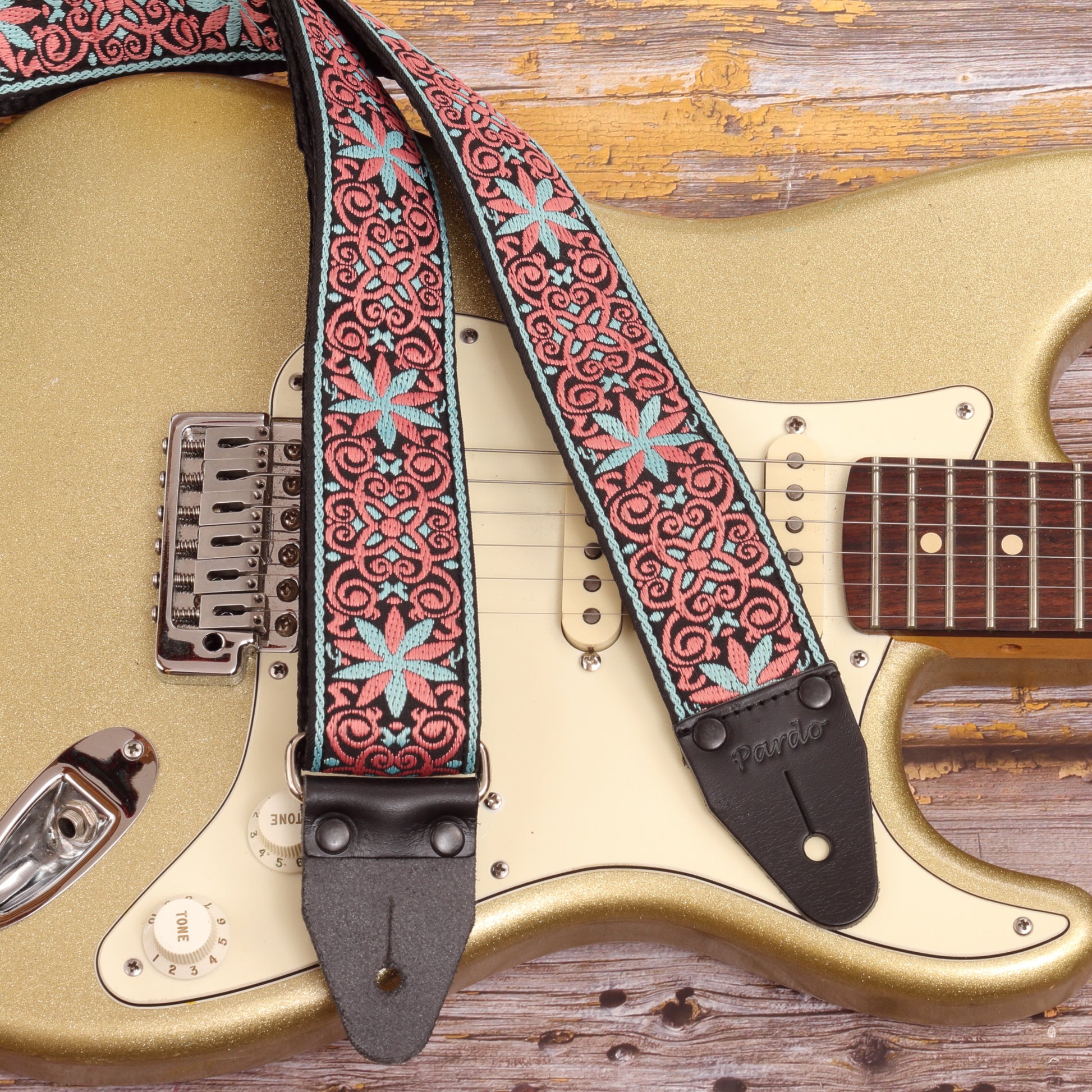 Star guitar strap - psychedelic patter - paired with a Fender Stratocaster Gold sparkle