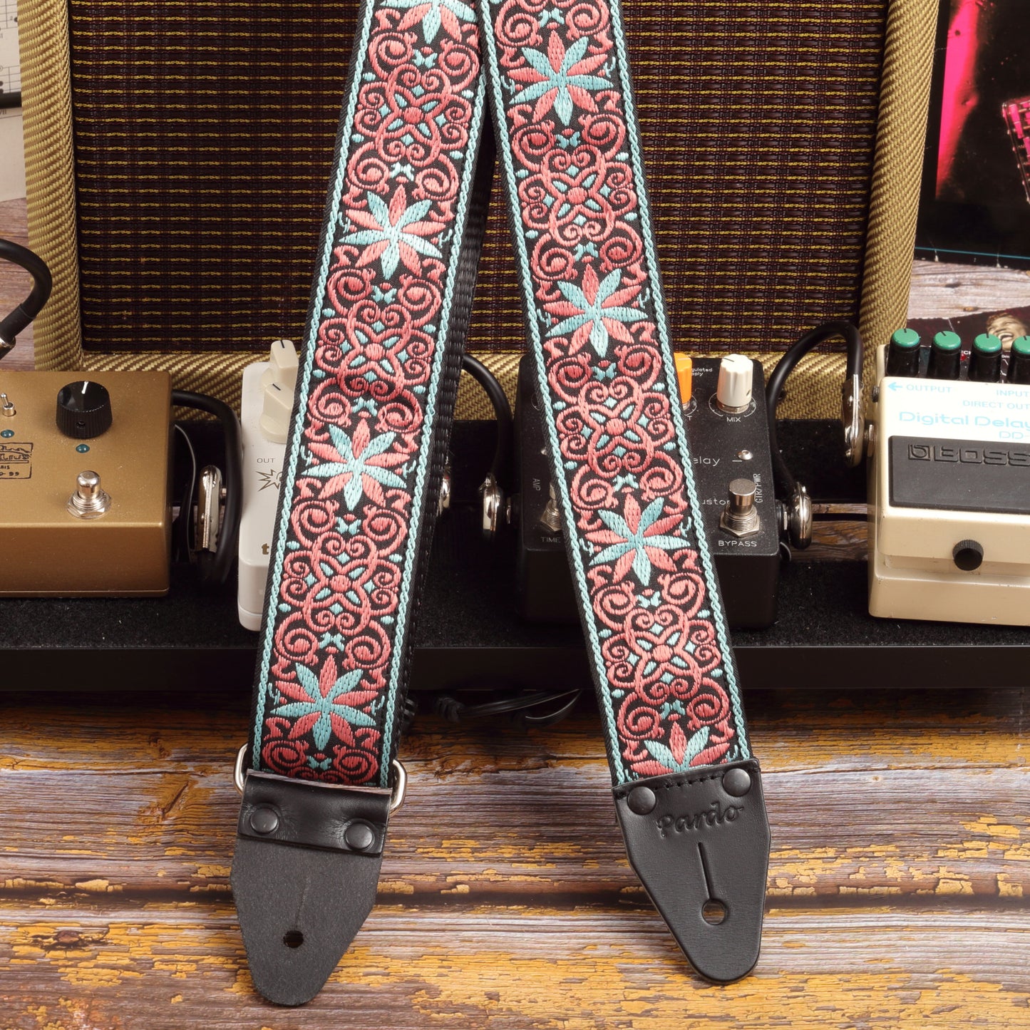 guitar strap or guitarists and musicians, with pedals and amplifier