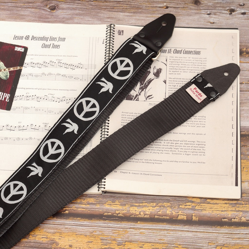 Backing seatbelt guitar strap with hippie patterns from the 60s
