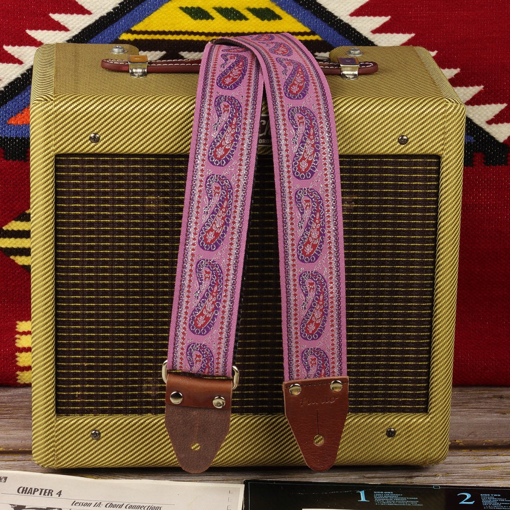 Custom Guitar Strap Inspired by the 60s and 70s, lilac paisley pattern, hippie aesthetics, strap paired with a Fender Champ amplifier