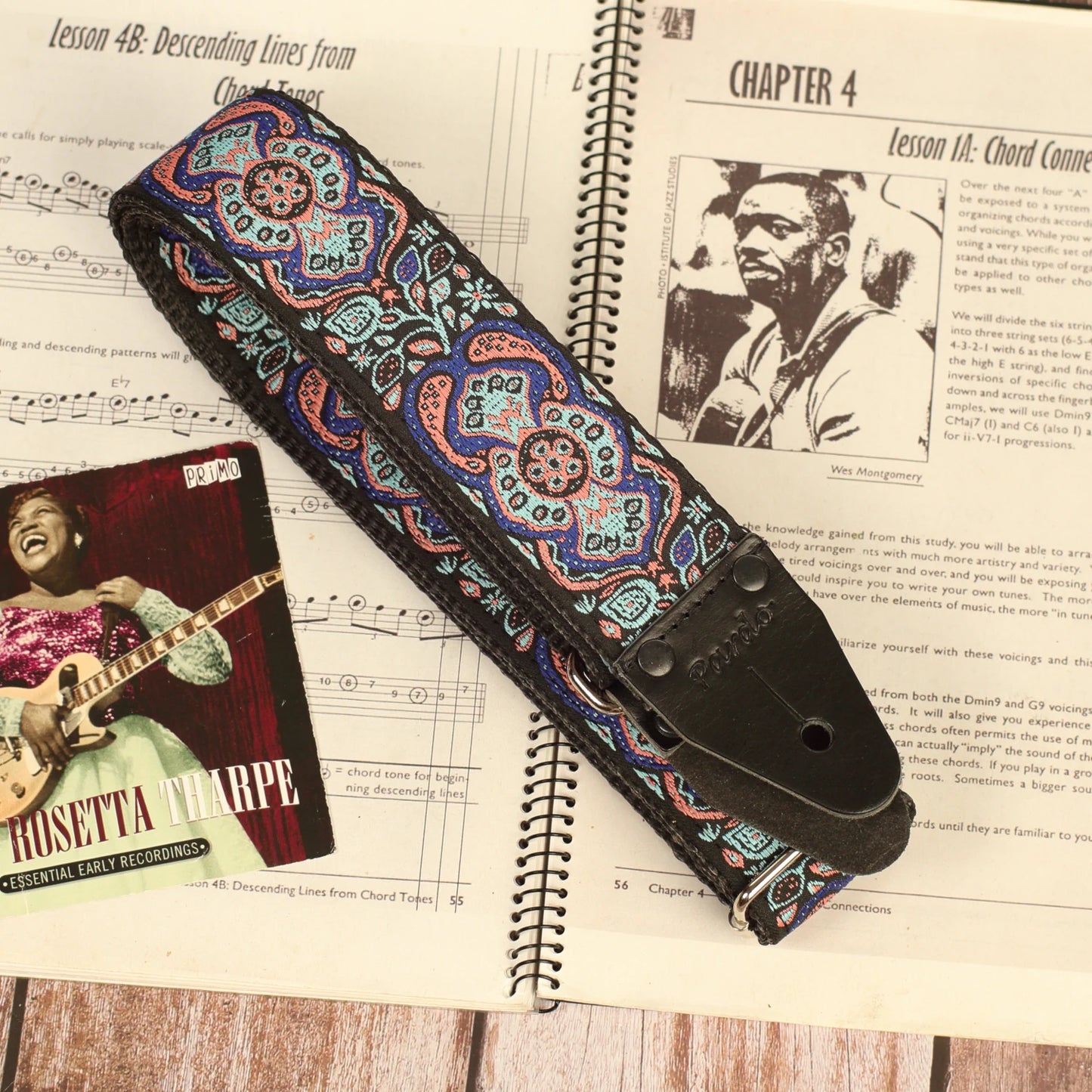 Blue Mirage handmade guitar strap close-up highlighting premium jacquard fabric and genuine leather ends