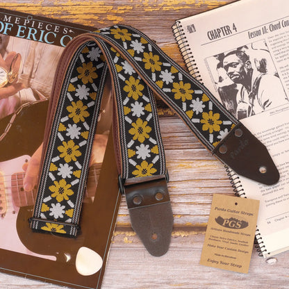 Frontside view of Rooftop John Lennon guitar strap replica, highlighting leather ends and metal hardware for custom options and hippie vintage style.