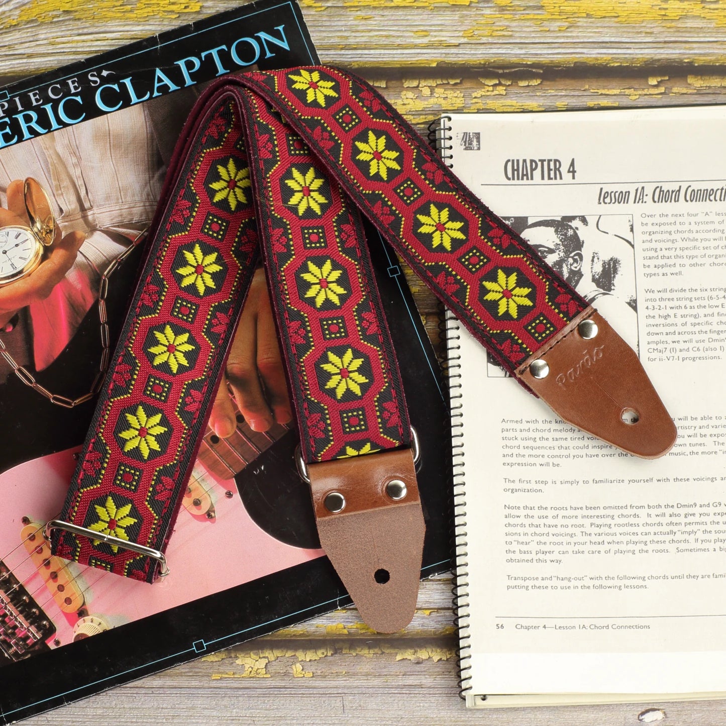 Close-up of the Mod Frame strap showing the detailed woven fabric, genuine leather ends and metal hardware.