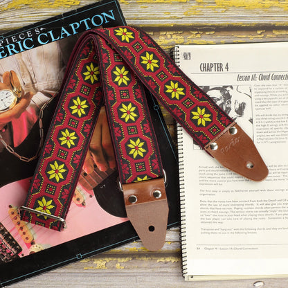 Close-up of the Mod Frame strap showing the detailed woven fabric, genuine leather ends and metal hardware.