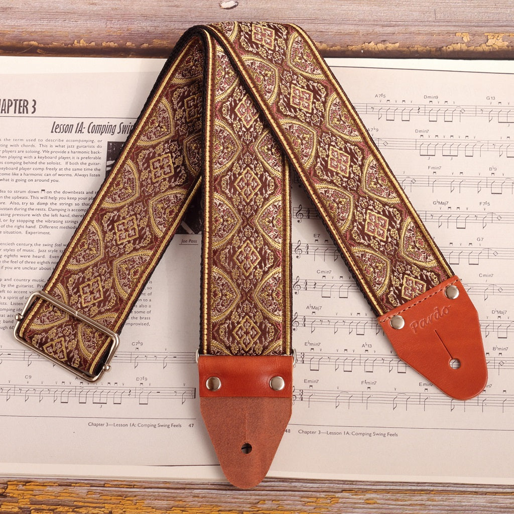 Front view of the hippie aesthetic wide guitar strap with psychedelic pattern - model Brown Mountain