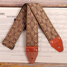 Front view of the hippie aesthetic wide guitar strap with psychedelic pattern - model Brown Mountain