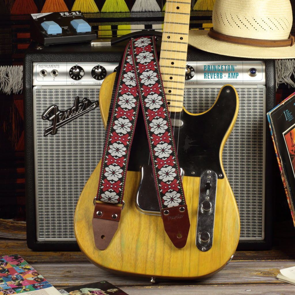 Newport strap inspired by hendrix with flowers, paired with a telecaster  and a princeton reverb