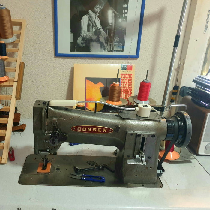 Sewing achine in workshop for make guitar straps from Pardo.