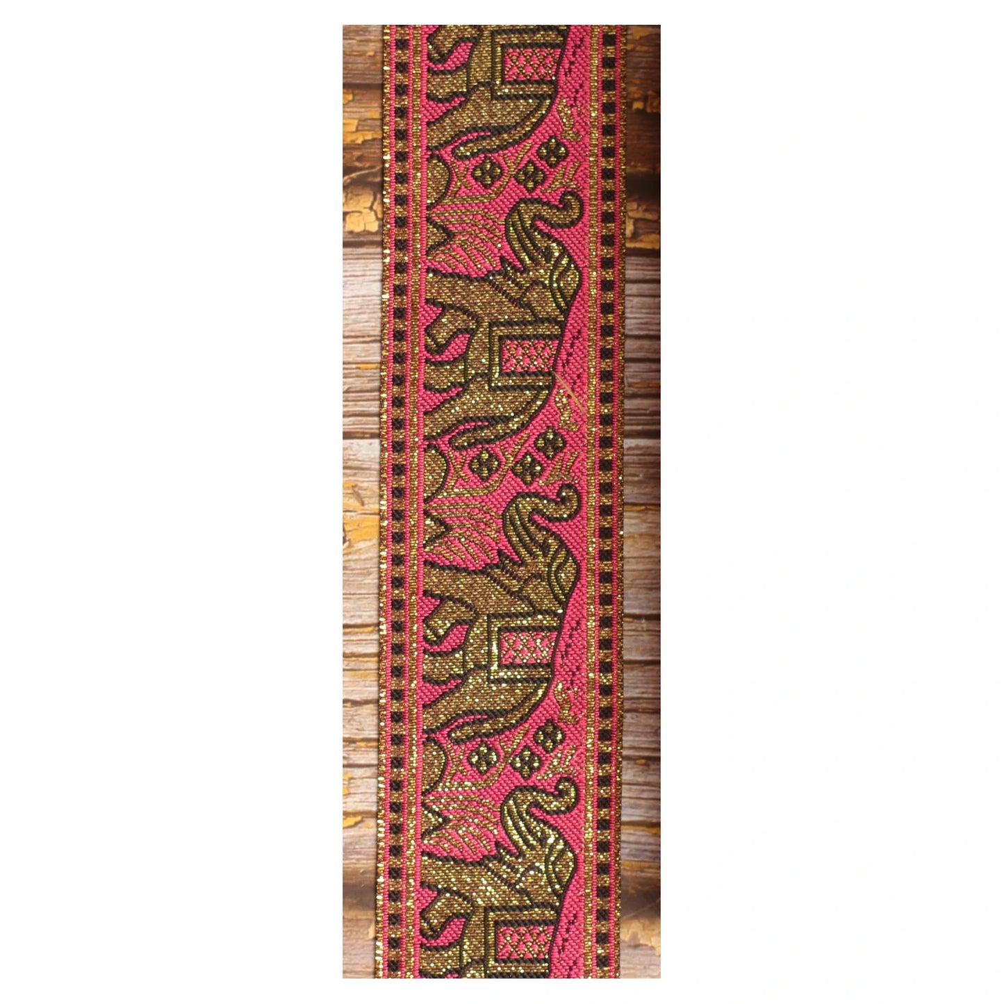 Pink and gold elephant guitar strap with decorative woven jacquard pattern and metallic details