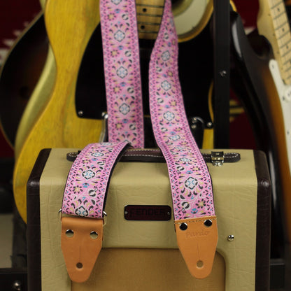 Pink Pheasant jacquard guitar strap with pink woven pattern