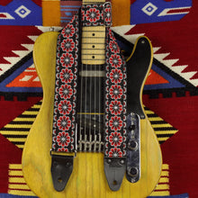 Red Flowers jacquard strap paired with a classic Telecaster electric guitar, highlighting style and fit