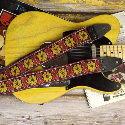 Close-up of the Retro Bell woven pattern alongside a Fender Telecaster 52, highlighting the decorative motifs and detailed textile construction.