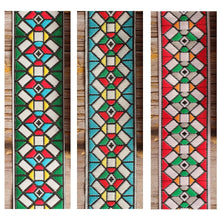 Stockholm guitar strap shown in three distinctive colorways side by side, highlighting the shared woven geometric pattern.