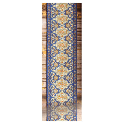 Close-up of the Blue Gothian guitar strap design featuring symmetrical blue, ivory, gold and orange ornamental details.