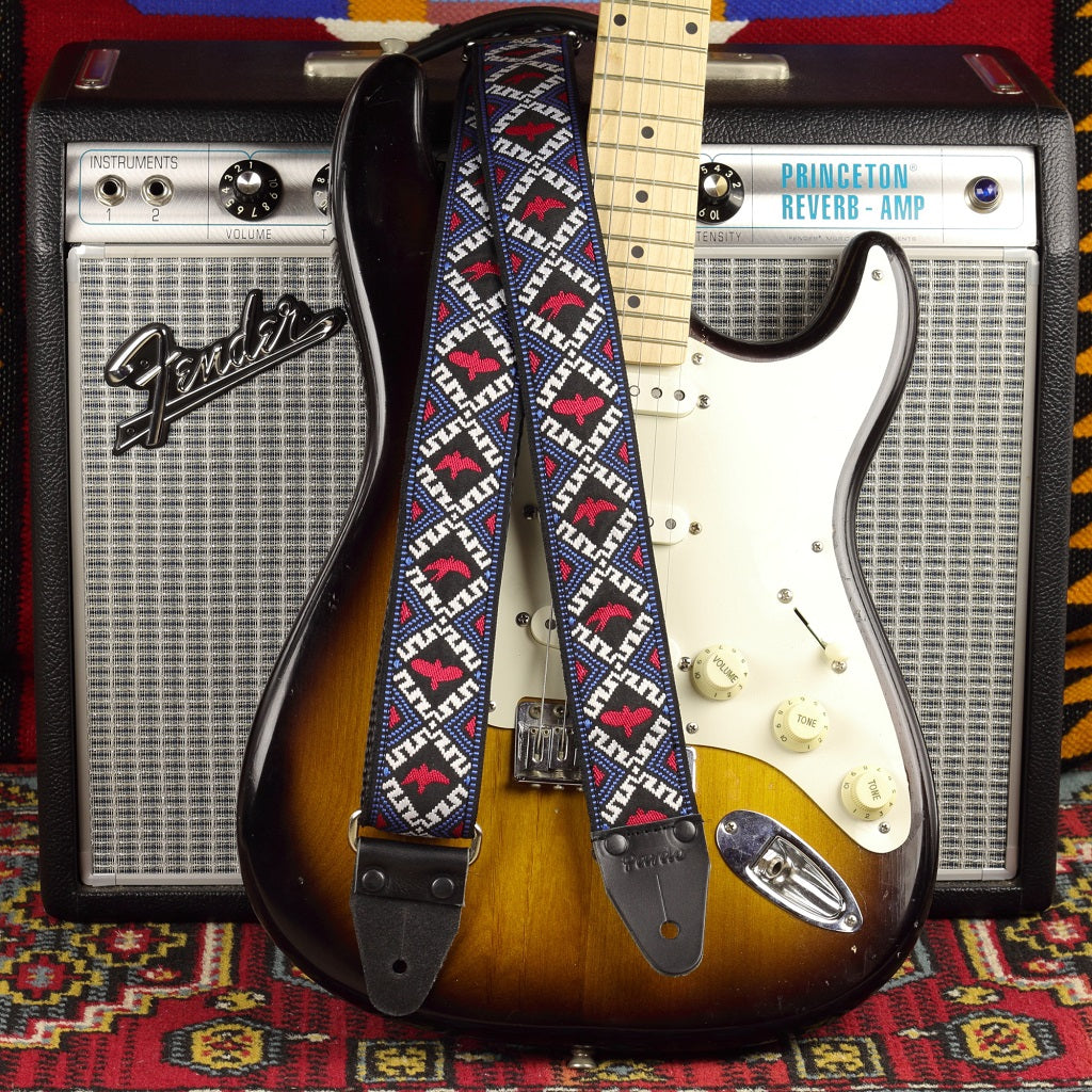 vintage guitar strap paired with a Fender stratocaster and a Fender Princeton Reverb amp