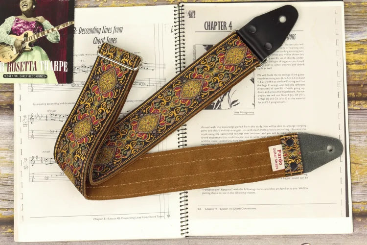 1960s-inspired hippie guitar strap featuring a retro geometric pattern in brown and gold tones