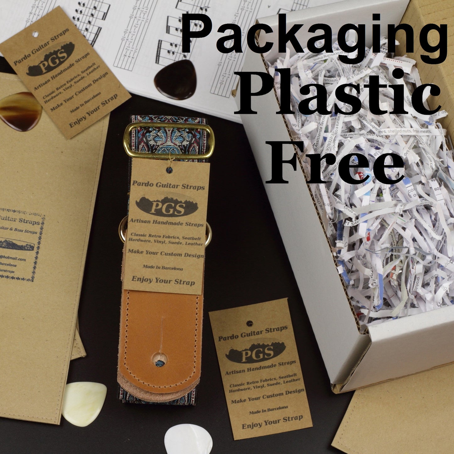 The strap is Packaged inside a small carton box, all the packaging is free of plastic.